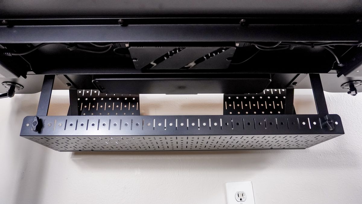 The metal cable management tray that comes included with the Corsair Platform 4: Elevate Desk