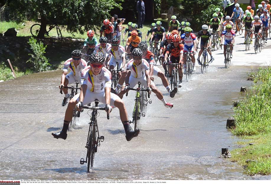 Riders avoid getting their feet wet during a stage of the Tour de San Luis