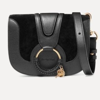 black crossbody bag in suede and leather with bridle round clasp