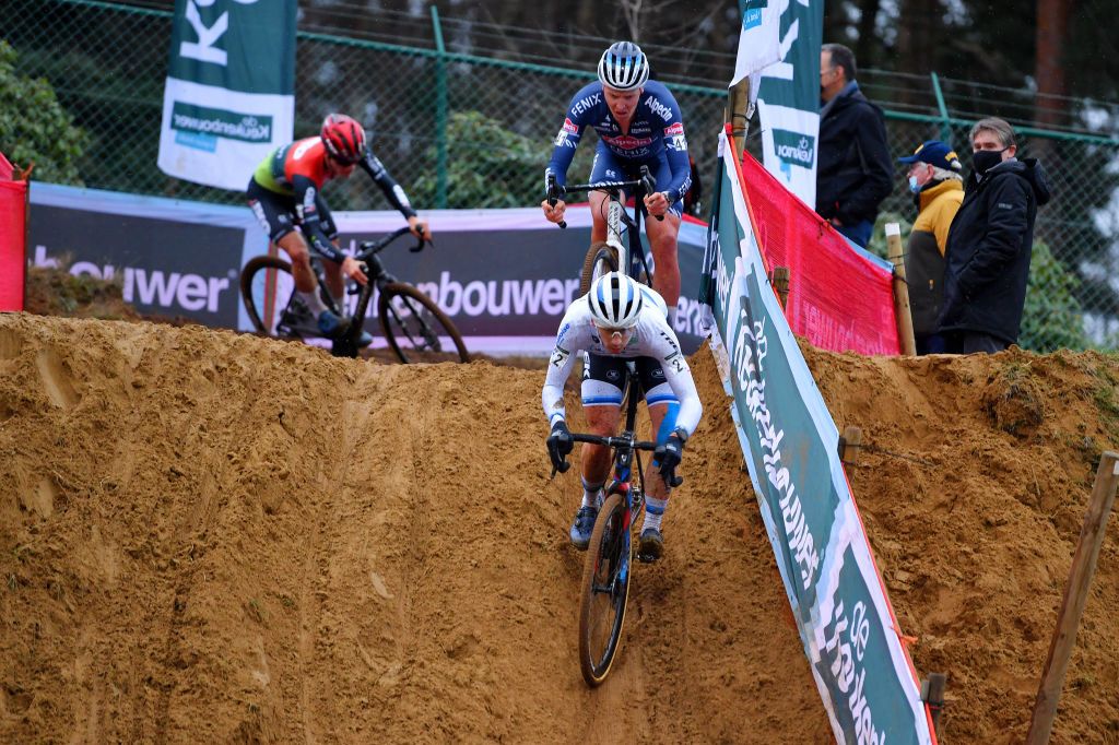 ZOLDER BELGIUM DECEMBER 27 Lars Van Der Haar of Netherlands and Team Baloise Trek Lions competes ahead of Tim Merlier of Belgium and Team AlpecinFenix during 17th Superprestige HeusdenZolder 2021 Mens Elite SuperprestigeCX SPHeusdenZolder on December 27 2021 in Zolder Belgium Photo by Luc ClaessenGetty Images