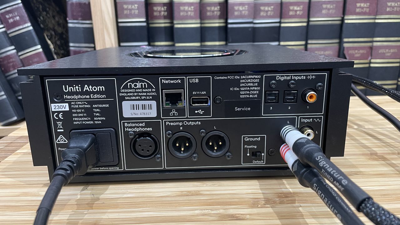 Naim Uniti Atom Headphone Edition on wooden rack