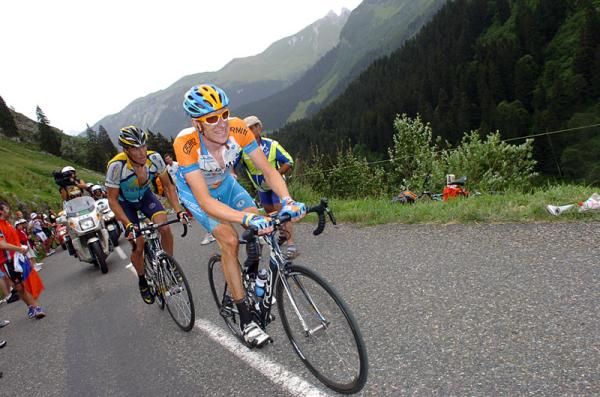 Bradley Wiggins (Garmin-Slipstream) climbs the Col de la Colombi&egrave;re with Lance Armstrong (Astana) on his wheel.