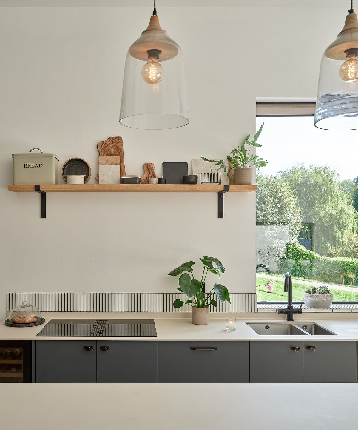 A new build kitchen with black light fixings