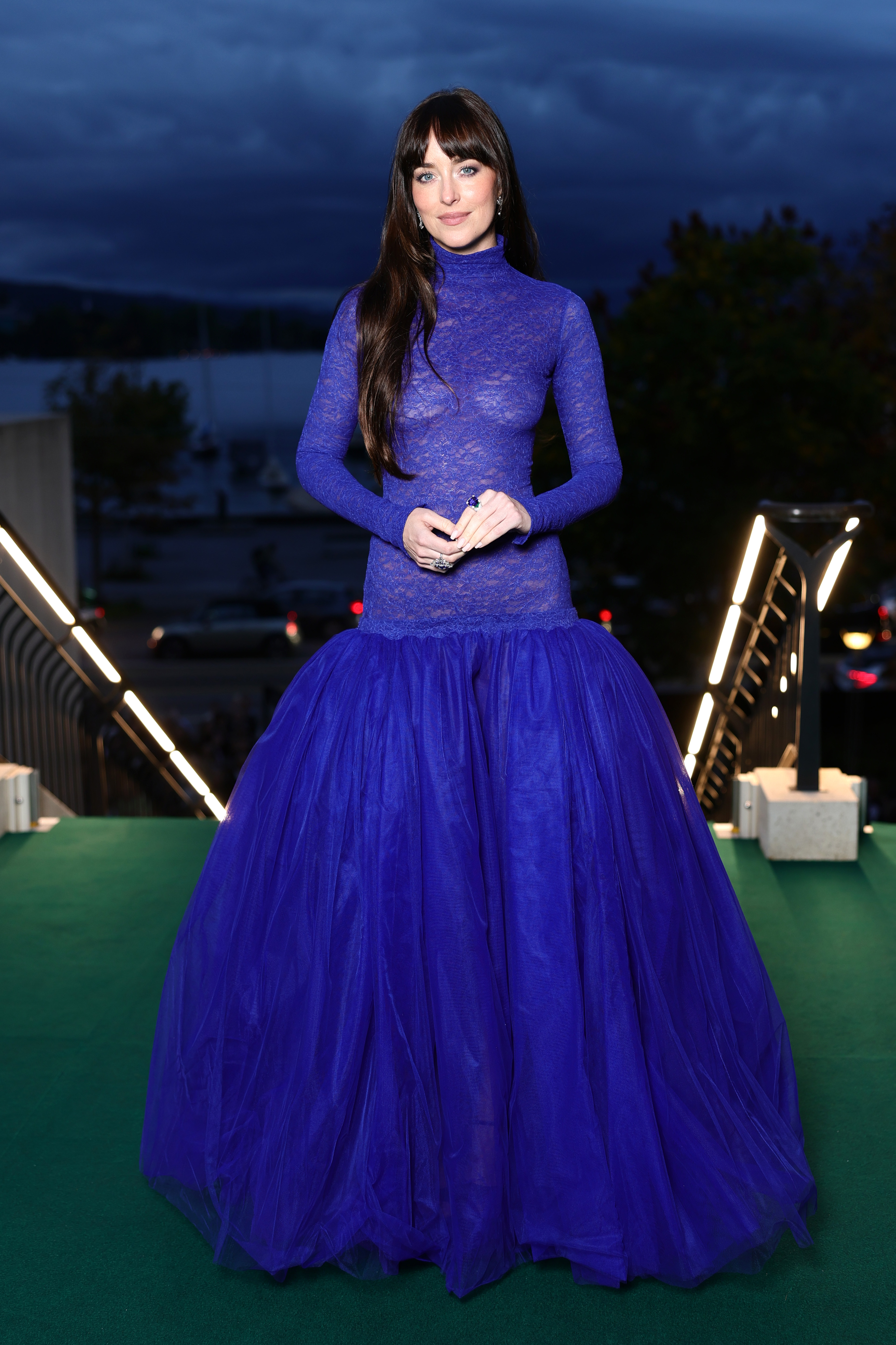 Dakota Johnson attended the Zurich Film Festival in a sheer drop-waist royal blue gown from Gucci