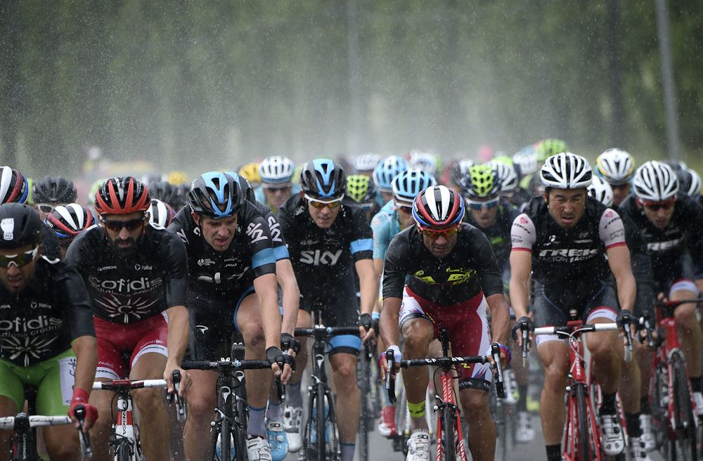 The peloton was hit with rain early during stage 4.