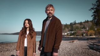 Detective Karl Alberg (played by Rossif Sutherland) and Cassandra Lee (Kristin Kreuk) look for the truth in "Murder in a Small Town" season 2