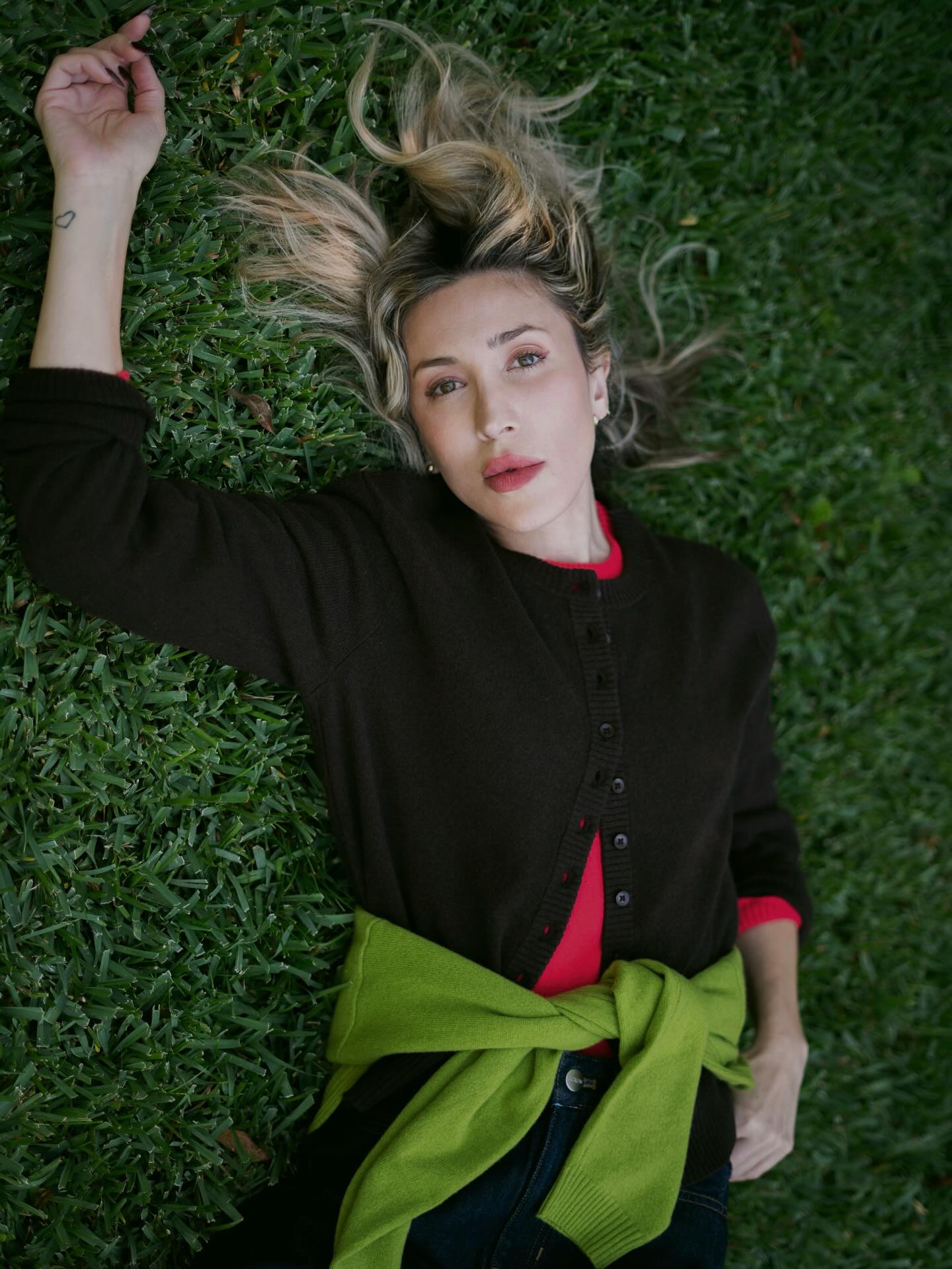 @angelafink wearing colored T-shirts under sweaters