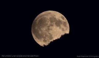 The Harvest Moon rises in Macedonia before the penumbral lunar eclipse.