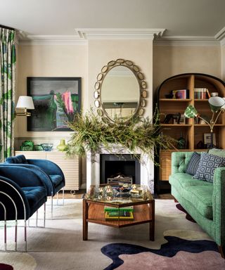 traditional living room with oversized Christmas garland on fireplace mantel