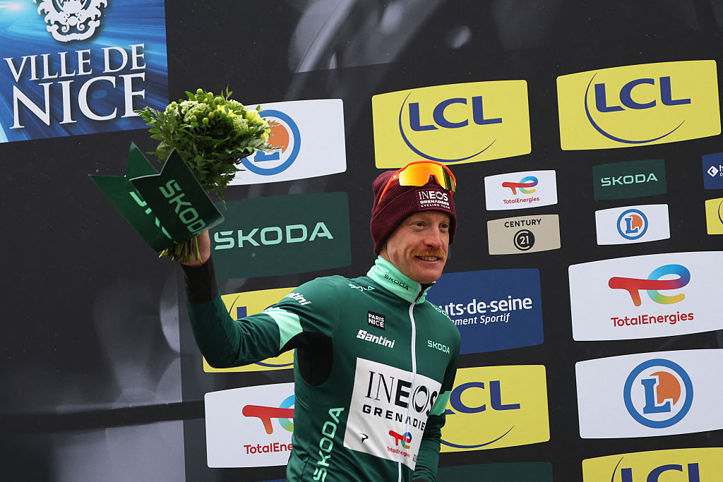 INEOS Grenadiers' French rider Dorian Godon celebrates his green jersey of best sprinter on the podium after the 7th stage of the Paris-Nice cycling race, 47 km between Le Broc and Isola-Village, on March 14, 2026. Due to deteriorating weather conditions, the route of stage 7 has been changed to a 47 km race from Le Broc to Isola. (Photo by Anne-Christine POUJOULAT / AFP)
