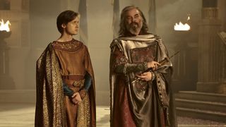 Kemen and Pharazon speak as they walk through Numenor in The Rings of Power season 2