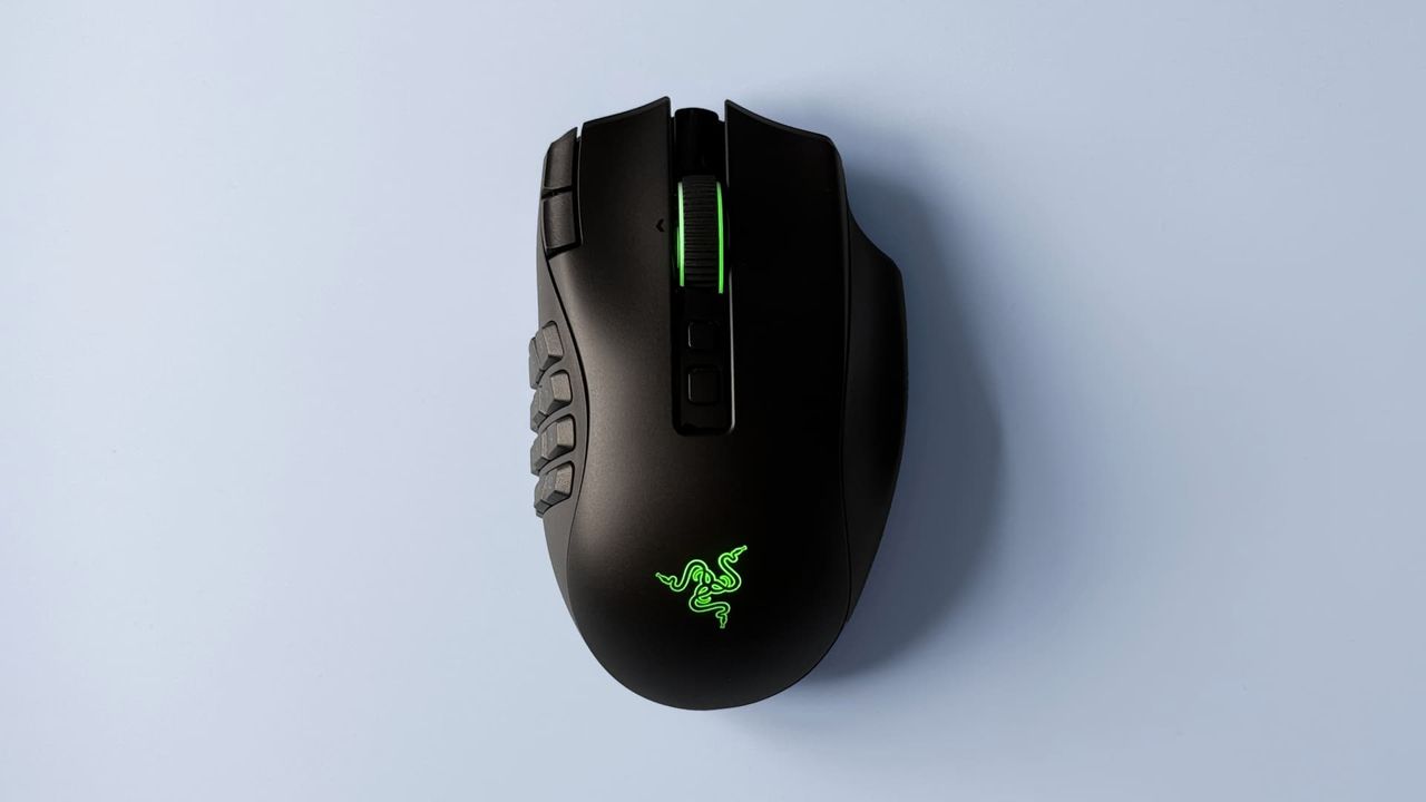 The Razer Naga V3 Pro mouse against a blue background.