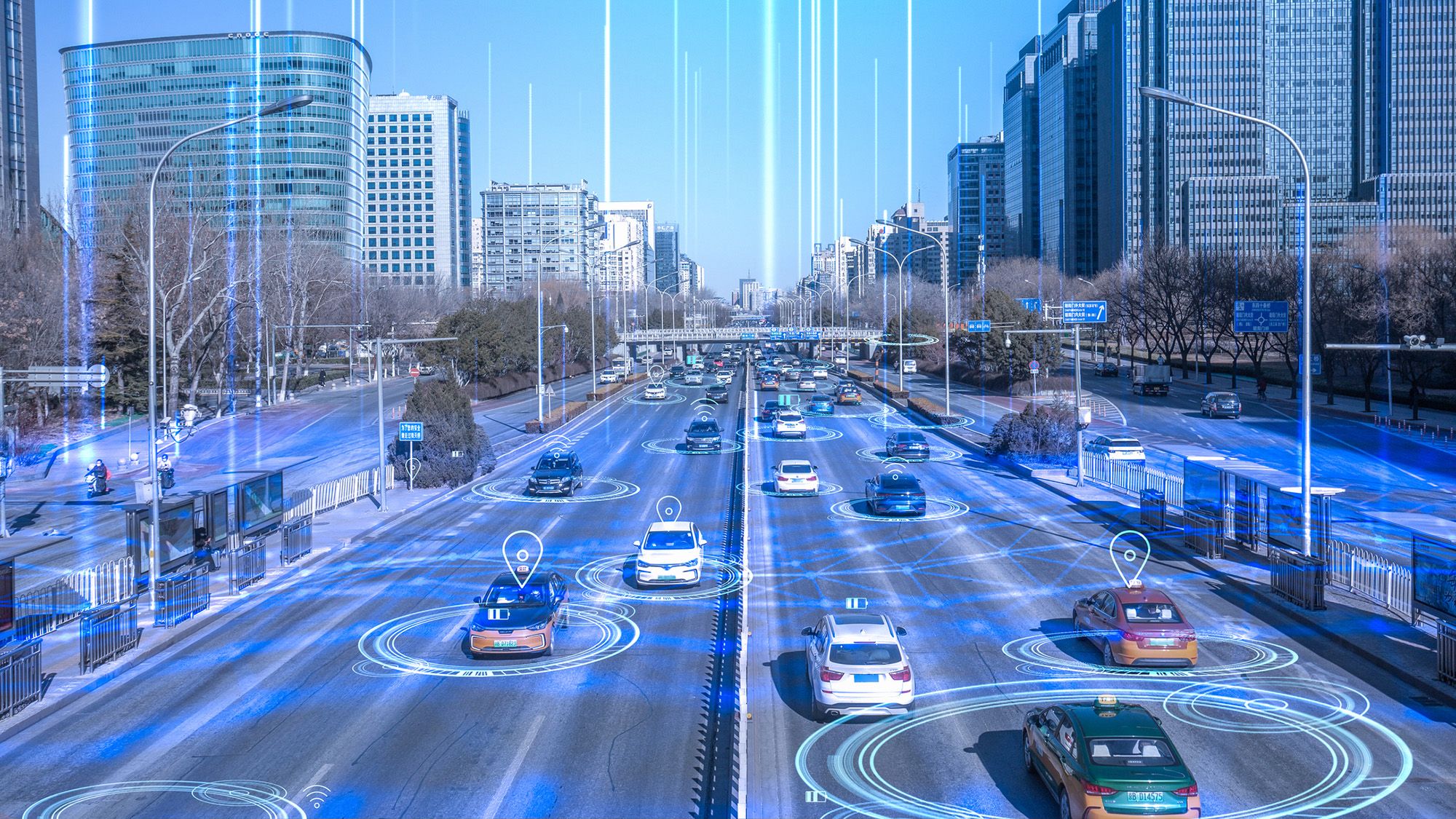 An image of cars on the road overlaid with blue circles and lines.