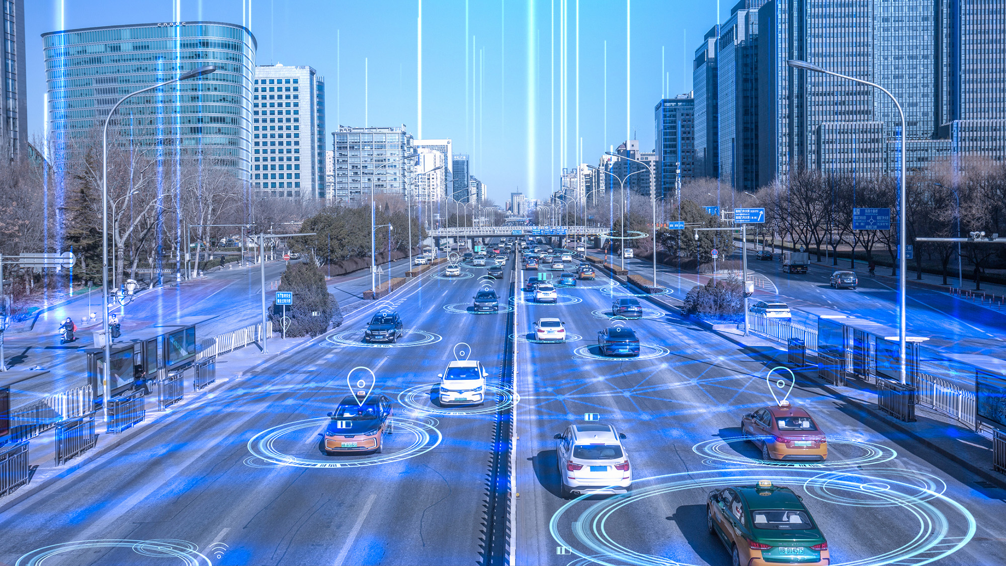 An image of cars on the road overlaid with blue circles and lines.