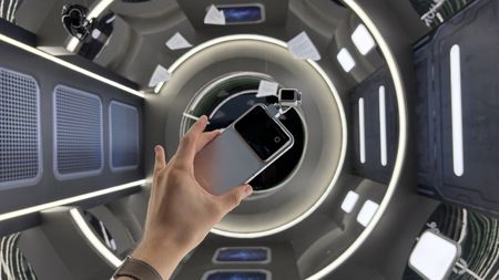 The Honor Robot phone being held in the hand