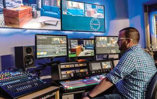 At SATV in San Antonio, Brian Groves uses a NewTek TriCaster TC1 switcher during a community cable  broadcast.