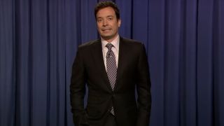 Jimmy Fallon wincing during his monologue on Late Night