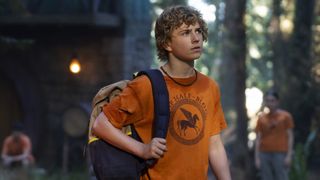 Percy walks into a forest camp in Percy Jackson and the Olympians' Disney Plus series