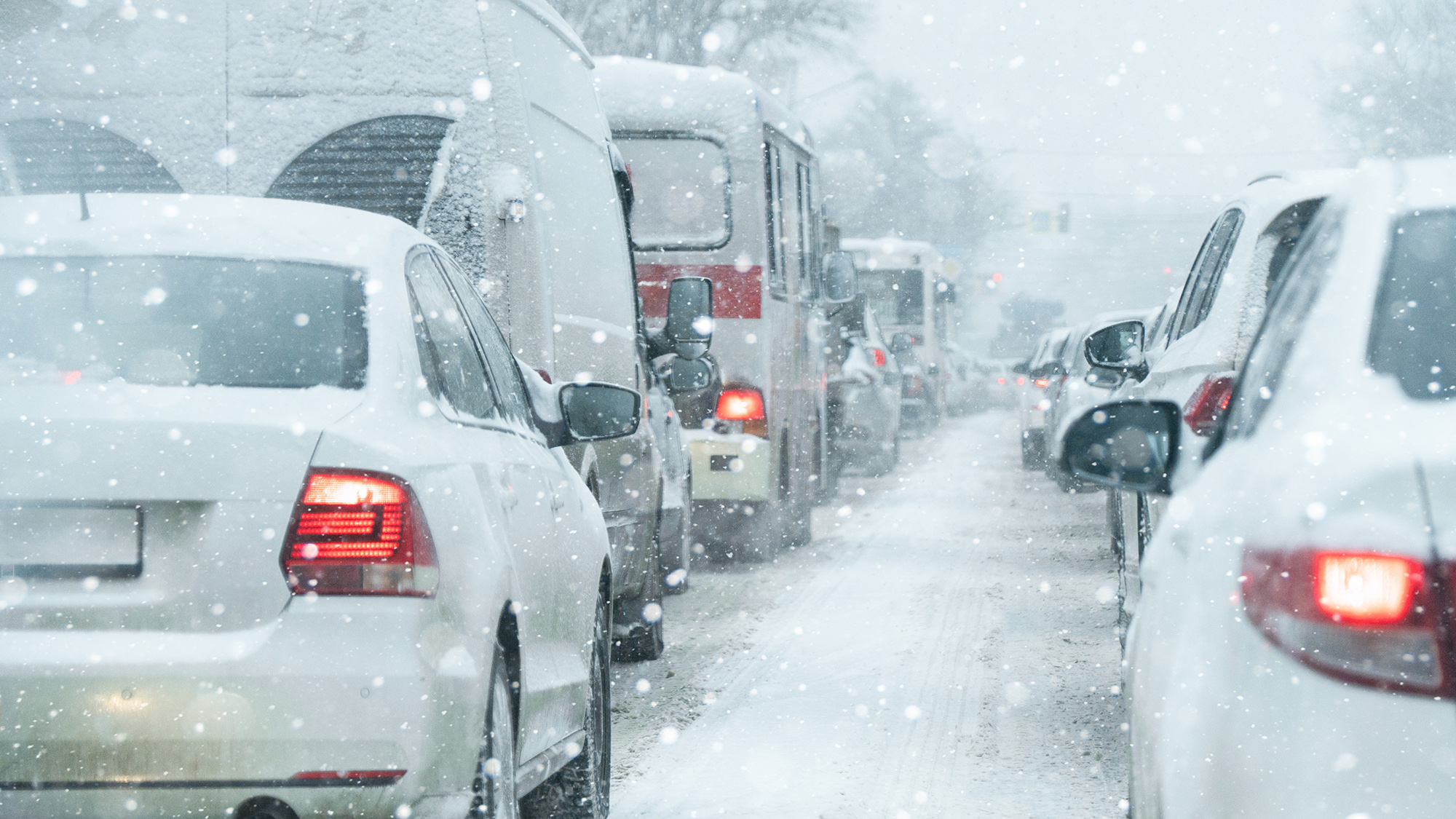 Traffic jam on a city street in winter ; Shutterstock ID 2697548641