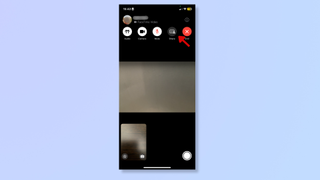 A screenshot of the FaceTime app on iPhone, with a red arrow pointing at the Share icon. 