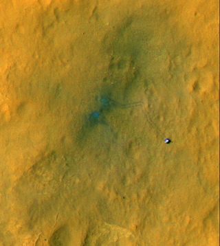 Mars rover Curiosity's tracks on Mars seen from space in this image released Sept. 6, 2012.