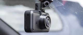 Miofive S1 dash cam in situ attached to car windscreen