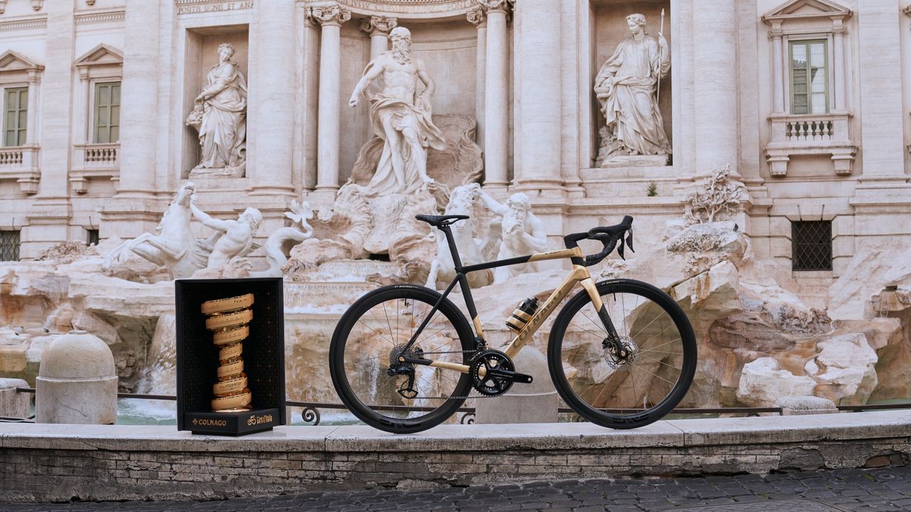 Colnago&#039;s Gioiello bike stands beside the Giro d&#039;Italia trophy 