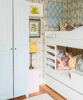 kids bedroom with wallpaper and bunk beds