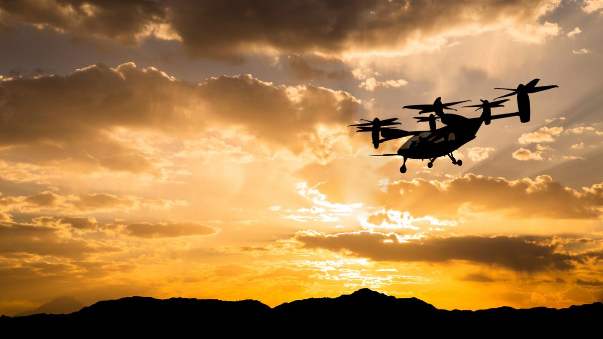 Air taxi in the sky at sunset.