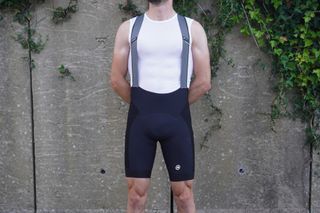 Male cyclist wearing the Assos Mille GTC Kiespanzer C2 Bib Shorts for gravel cycling