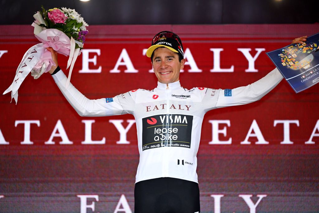 FOSSANO ITALY MAY 06 Cian Uijtdebroeks of Belgium and Team Visma Lease a Bike celebrates at podium as White best young jersey winner during the 107th Giro dItalia 2024 Stage 3 a 166km stage from Novara to Fossano 374m UCIWT on May 06 2024 in Fossano Italy Photo by Tim de WaeleGetty Images