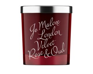 Jo Malone Velvet Rose & Oud Scented Home Candle in deep red glass vessel with metal lid