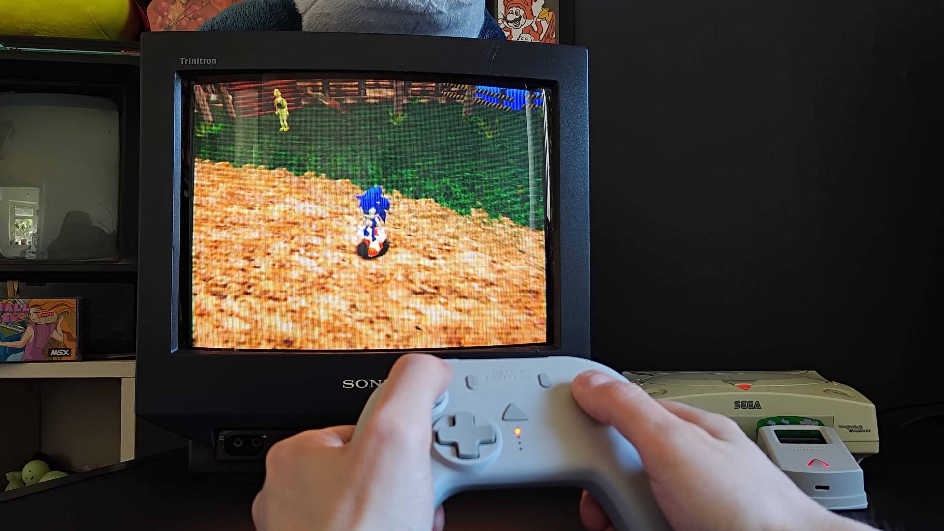 Phil Hayton using Retro Fighters StrikerDC to play Sonic Adventure for Sega Dreamcast on Sony Trinitron CRT TV.