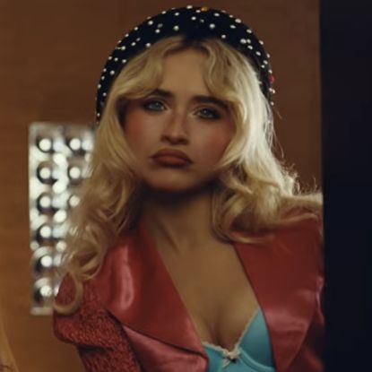 Sabrina Carpenter wore a bra top and micro-mini, leopard-print hot pants in the "House Tour" music video