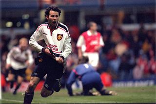 BIRMINGHAM, ENGLAND - APRIL 4: Ryan Giggs celebrates scoring a magnificent winning goal for United as they defeat Arsenal 2-1 in extra time during the 1999 FA Cup Semifinal Replay on April 14th, 1999 at Villa Park. (Photo by Matthew Peters/Manchester United via Getty Images)