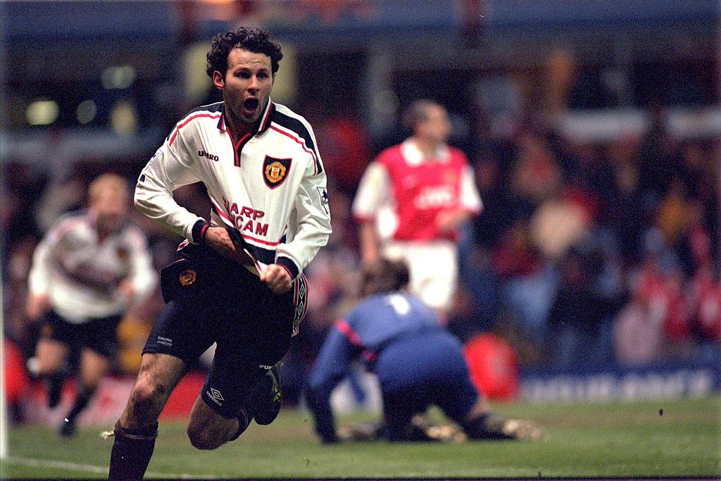 BIRMINGHAM, ENGLAND - APRIL 4: Ryan Giggs celebrates scoring a magnificent winning goal for United as they defeat Arsenal 2-1 in extra time during the 1999 FA Cup Semifinal Replay on April 14th, 1999 at Villa Park. (Photo by Matthew Peters/Manchester United via Getty Images)