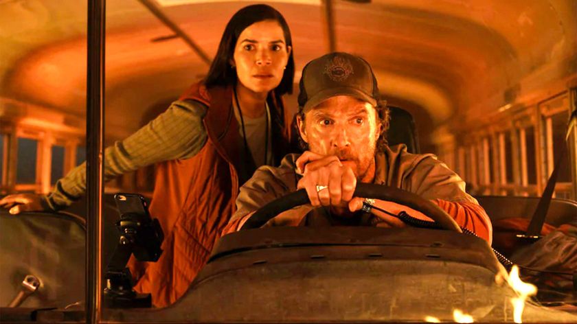 L-R: Mary (America Ferrera) and Kevin (Matthew McConaughey) inside the school bus in a scene from Apple TV Plus&#039; &quot;The Lost Bus&quot;