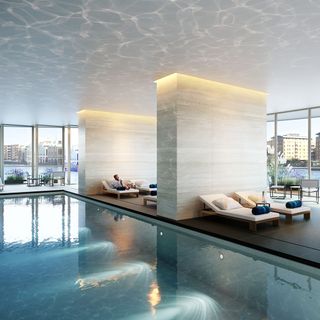indoor pool with sunloungers