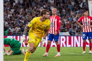 Lazio goalkeeper Ivan Provedel celebrates his late equaliser against Atletico Madrid in the Champions League in September 2023.