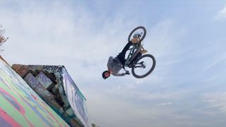 Dylan Stark flipping his YT mountain bike