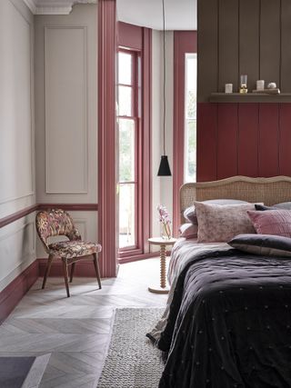 bedroom painted with selection of pink, red and white shades