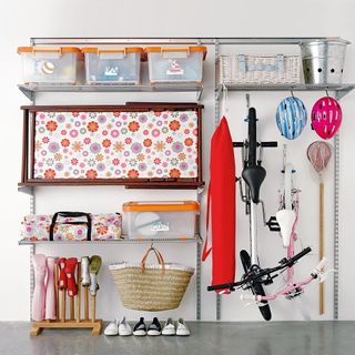 bike storage with white wall and shelves