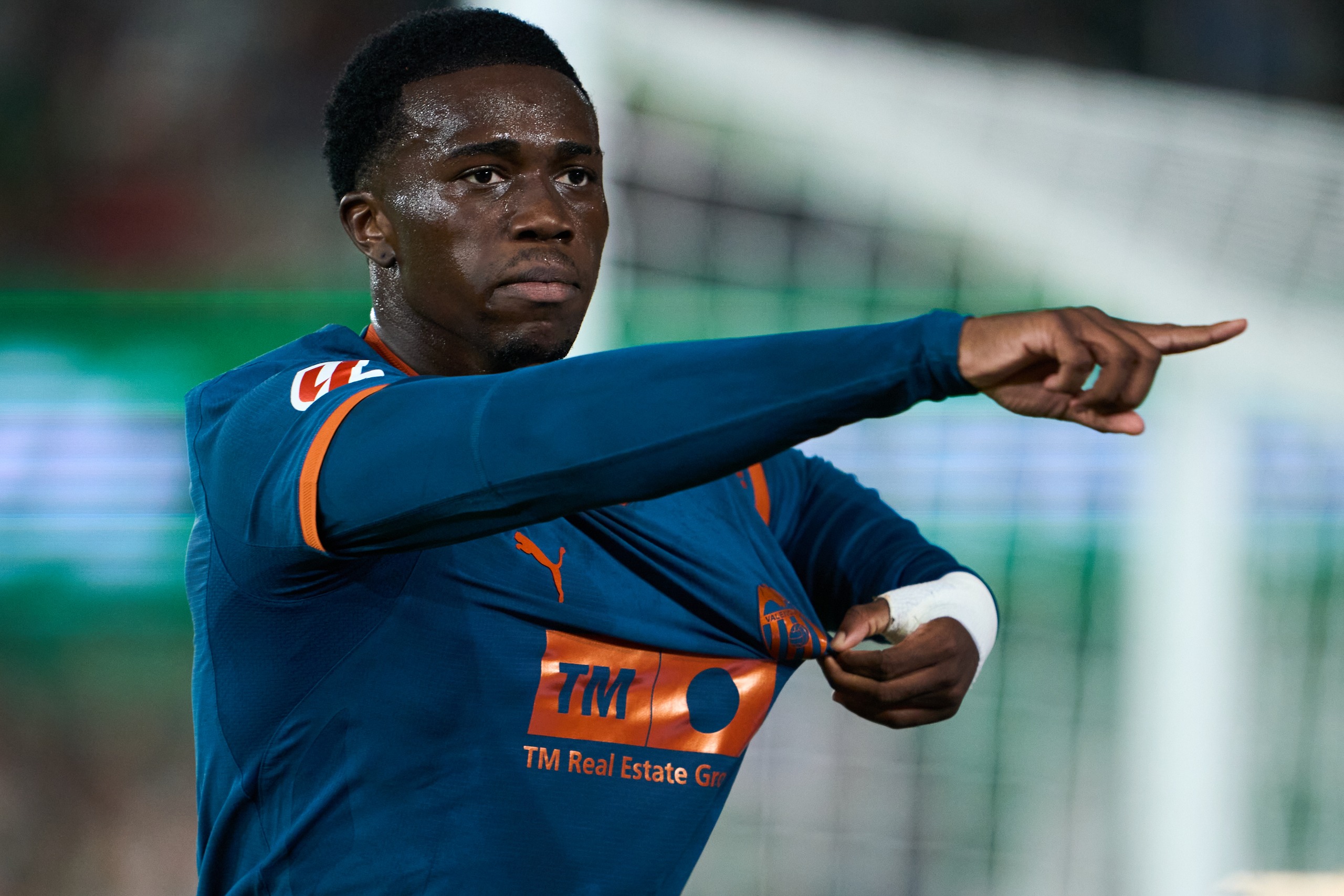 David Otorbi celebrates a goal for Valencia