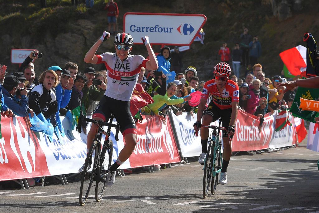Tadej Pogacar (UAE Team Emirates) wins stage 13 ahead of Primoz Roglic (Jumbo-Visma)