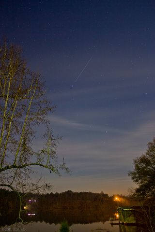 Skywatcher Tommy Mosley took this picture of the Geminid meteor shower from the Black Warrior River in Oak Grove, Alabama.