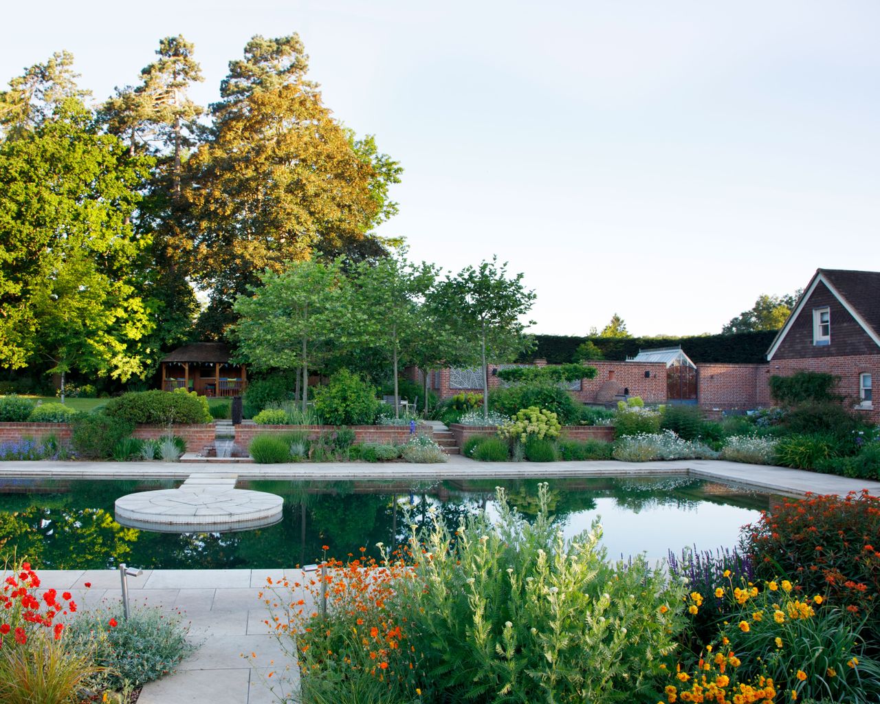 natural pool area beside raised terrace for seating