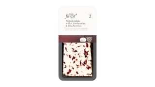 A packet of Tesco Finest Wensleydale cheese with cranberries