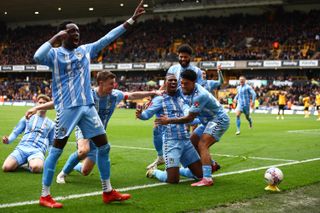 Coventry City celebrate after beating Wolves 3-2 to reach the FA Cup semi-finals.