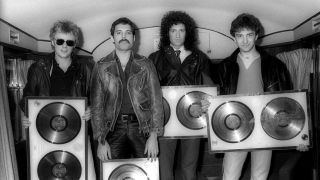 Queen with gold disc awards for the Greatest Hits album