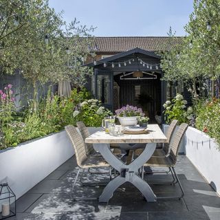 garden with roof and table and chair